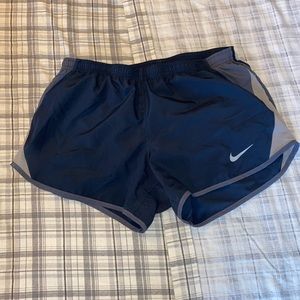 Navy Nike running shorts